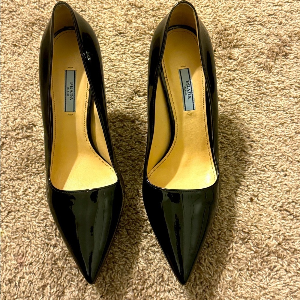 Brand new, without tags. Never worn Prada platform heels.